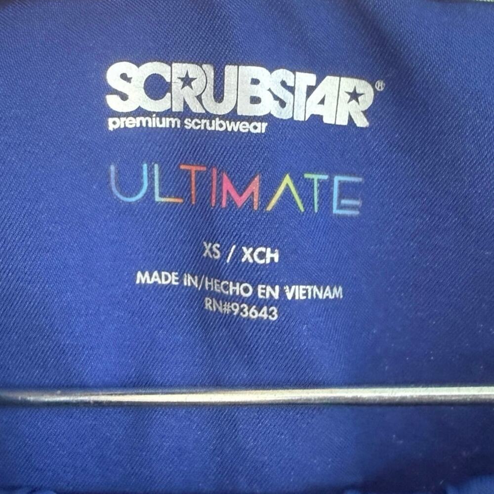 Scrubstar Ultimate XS women’s blue scrub top, three pockets badge loop - Picture 7 of 9